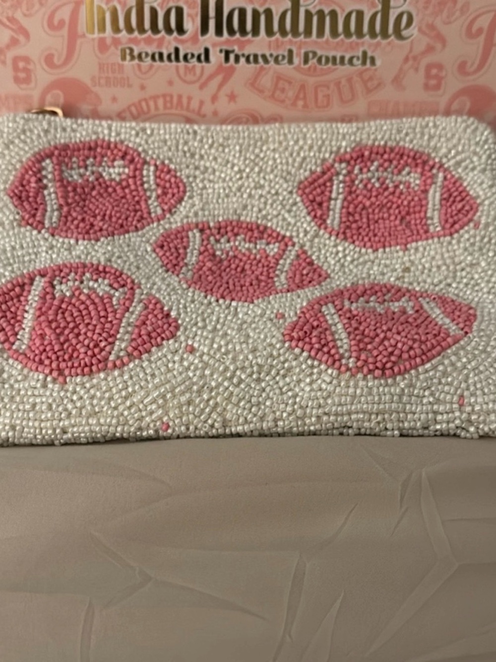 White Beaded Travel Pouch with Pink Football Motif